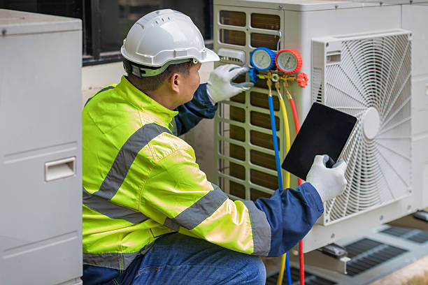 Professional Heat Pump Repair technician working in Teterboro, NJ